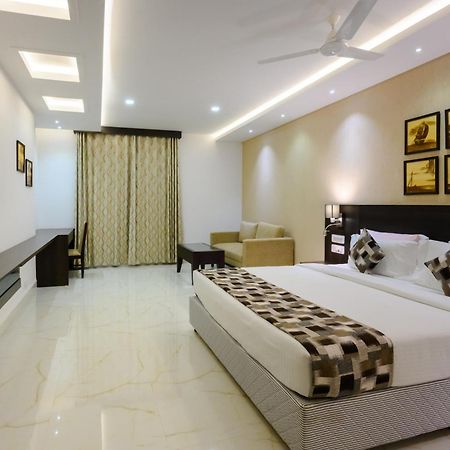 Essentia Manipal Inn Удипи Экстерьер фото