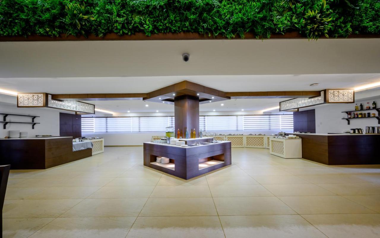 Essentia Manipal Inn Удипи Экстерьер фото